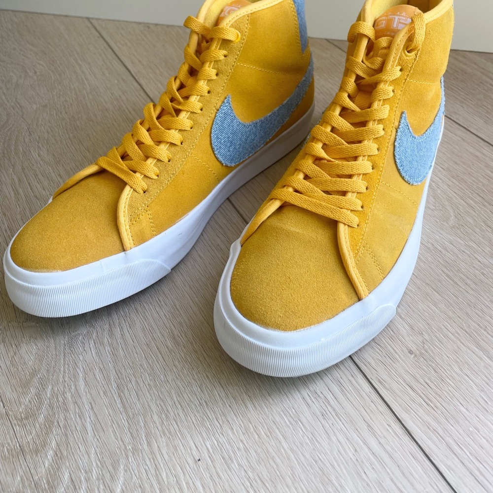 Nike High-Top Grant Taylor Sneakers in University Gold and Light Blue.